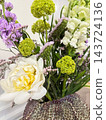 Elegant Spring Flower Bouquet in Decorative Ceramic Vase. 143724136