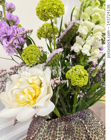 Elegant Spring Flower Bouquet in Decorative Ceramic Vase. Elegant Spring Flower Bouquet in Decorative Ceramic Vase. 143724136
