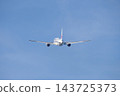 A JAL Boeing 767 passenger plane retracts its landing gear as it takes off from Izumo Enmusubi Airport bound for Haneda: Izumo City, Shimane Prefecture (sunny) 143725373