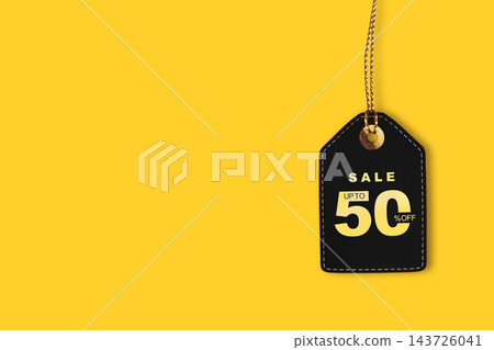 Black sale tag on bright yellow background for Black Friday discounts promotions retail offers and shopping campaigns Black sale tag on bright yellow background for Black Friday discounts promotions retail offers and shopping campaigns 143726041