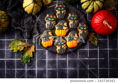 Halloween cookies in shape of black cat Halloween cookies in shape of black cat 143726381