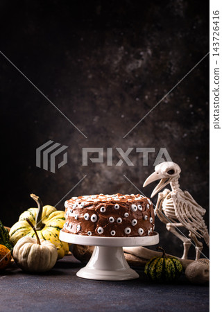 Spooky Halloween cake with eyes Spooky Halloween cake with eyes 143726416