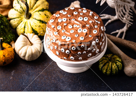 Spooky Halloween cake with eyes Spooky Halloween cake with eyes 143726417