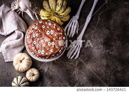 Spooky Halloween cake with eyes Spooky Halloween cake with eyes 143726421