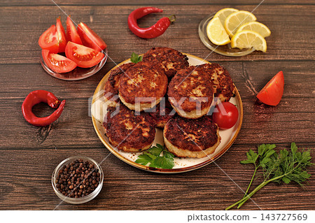 Homemade patties made from ground beef and pork featuring onion, tomato, lemon, garlic, recipe for delicious schnitzels and beef steaks, menu options for cafe banner for fastfood establishment Homemade patties made from ground beef and pork featuring onion, tomato, lemon, garlic, recipe for delicious schnitzels and beef steaks, menu options for cafe banner for fastfood establishment 143727569