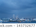 A scene of Japan Coast Guard patrol vessels and port facilities anchored in Yokohama Port at dusk. A scene of Japan Coast Guard patrol vessels and port facilities anchored in Yokohama Port at dusk. 143732677
