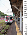 A Matsuura Railway Nishikyushu Line train stopped at the platform of Arita Station. 143732846