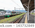 The Limited Express Midori train is stopped at the platform of Arita Station. 143732849
