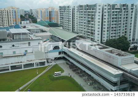 Modern City View with Elevated Train Station and Apartments Modern City View with Elevated Train Station and Apartments 143733619
