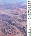 View of the northern mountainous region of Saudi Arabia from an Emirates flight between Dubai and Venice. View of the northern mountainous region of Saudi Arabia from an Emirates flight between Dubai and Venice. 143734887