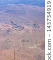 View of the Central Pivot formations in the northern Arabian Peninsula from an Emirates flight between Dubai and Venice. View of the Central Pivot formations in the northern Arabian Peninsula from an Emirates flight between Dubai and Venice. 143734919