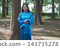 A young woman batting forest A young woman batting forest 143735278