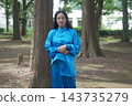 A young woman batting forest A young woman batting forest 143735279