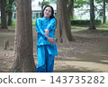 A young woman batting forest A young woman batting forest 143735282
