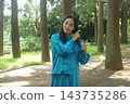 A young woman batting forest A young woman batting forest 143735286