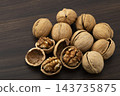 Walnuts in their shells Walnuts in their shells 143735875