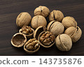Walnuts in their shells Walnuts in their shells 143735876