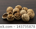 Walnuts in their shells Walnuts in their shells 143735878