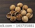 Walnuts in their shells Walnuts in their shells 143735881