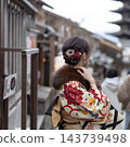 A woman in a kimono 143739498