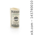Pack of dollars rolled with a rubber band isolated 143740010