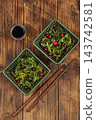 Seaweed salad bowl with cranberries,vegan superfood. 143742581