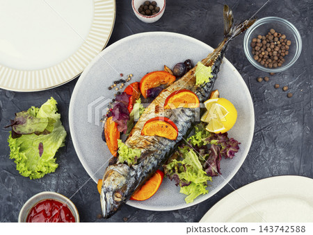 Gourmet baked mackerel with orange and mandarin Gourmet baked mackerel with orange and mandarin 143742588
