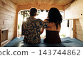 Mature couple enjoying camper van retirement road trip 143744862