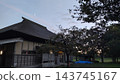 A scene of persimmon trees and traditional Japanese houses. 143745167