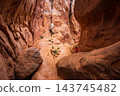 Young Hiker Exploring Fiery Furnace Trail in Utah 143745482