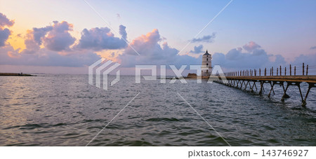 Alexandria Egypt Lighthouse and Mediterranean Sea at Sunset, Peaceful Seascape with Historic Pier, Magical Clouds, Amazing Sky, Solitude, Calm Alexandria Egypt Lighthouse and Mediterranean Sea at Sunset, Peaceful Seascape with Historic Pier, Magical Clouds, Amazing Sky, Solitude, Calm 143746927