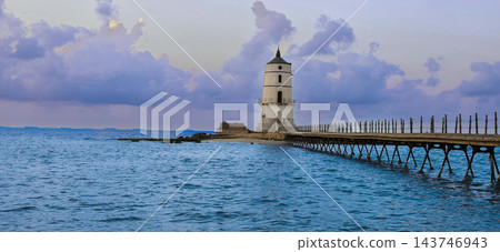 Alexandria Egypt Lighthouse and Mediterranean Sea at Sunset, Peaceful Seascape with Historic Pier, Magical Clouds, Amazing Sky, Solitude, Calm Alexandria Egypt Lighthouse and Mediterranean Sea at Sunset, Peaceful Seascape with Historic Pier, Magical Clouds, Amazing Sky, Solitude, Calm 143746943