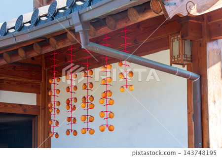 Traditional Korean Hanok Houses and Tiled Roofs against Bukhansan Mountain in Eunpyeong Hanok Village, Seoul Traditional Korean Hanok Houses and Tiled Roofs against Bukhansan Mountain in Eunpyeong Hanok Village, Seoul 143748195