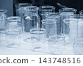 A group of wide mouth bottles in a modern blue tone scene 143748516