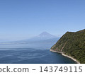 The sea of West Izu, coastal cliffs covered with forests, and Mount Fuji in the distance. 143749115