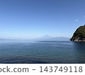 The calm sea of West Izu, the coastal cliffs covered with forests, and Mount Fuji in the distance. 143749118