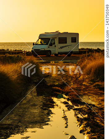 Camper car on beach at sunrise Camper car on beach at sunrise 143750349