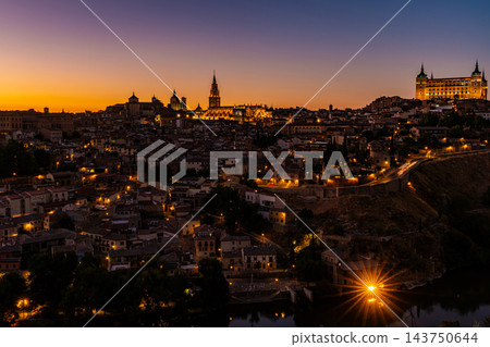 Illuminated Toledo Skyline at Dusk with Starburst Light 143750644