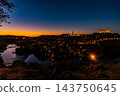 Illuminated Toledo Skyline at Dusk with Starburst Light 143750645
