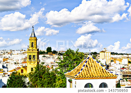 Bell tower of the Church of Santiago in Alcala de Guadaira, located in Plaza del Derribo; Seville. Bell tower of the Church of Santiago in Alcala de Guadaira, located in Plaza del Derribo; Seville. 143750950