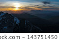 Rocky snow mountains at sunset aerial 143751450