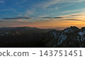 Rocky snow mountains at sunset aerial 143751451