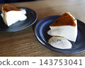 A cross-section of a melting cheesecake. A golden brown color and rich texture. 143753041