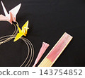 Black background, origami crane and fan 143754852
