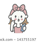 A woman with a headband applying cream. 143755197