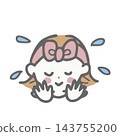 A woman with a hairband washing her face 143755200
