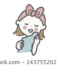 A woman with a headband wiping her face with a towel. 143755202