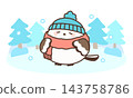 A long-tailed tit, snuggled up in a scarf and hat in the winter forest. 143758786
