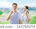 Senior couple rehydrating during exercise Senior couple rehydrating during exercise 143760259