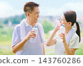 Senior couple rehydrating during exercise Senior couple rehydrating during exercise 143760286